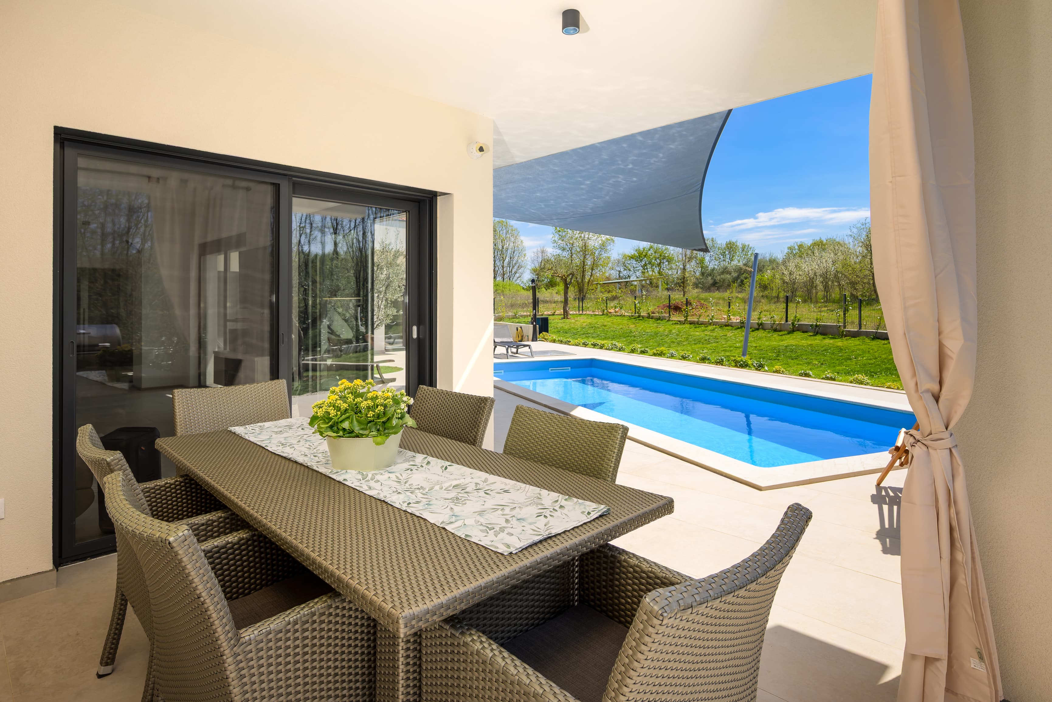 Covered outdoor dining table